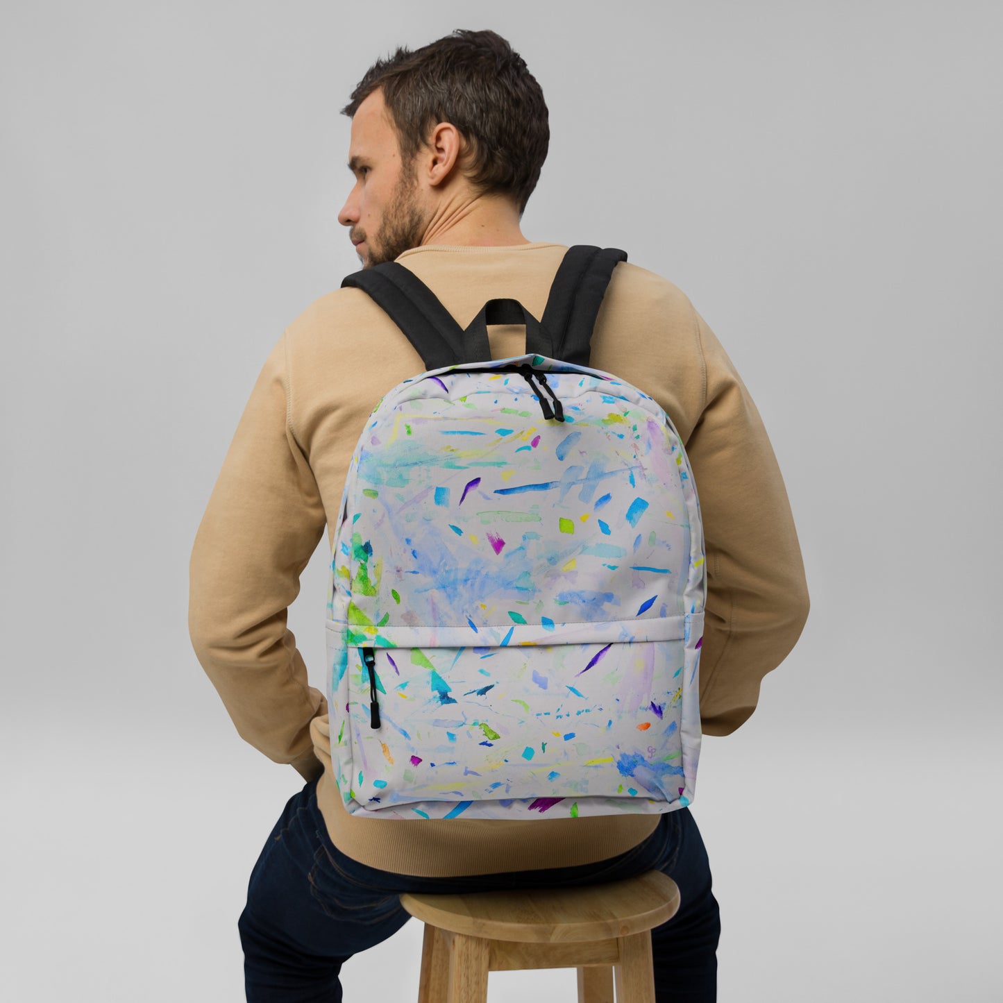 Stylish backpack featuring original artwork, with spacious compartments and durable construction—perfect for school, travel, work, or everyday use; combines function with artistic flair.