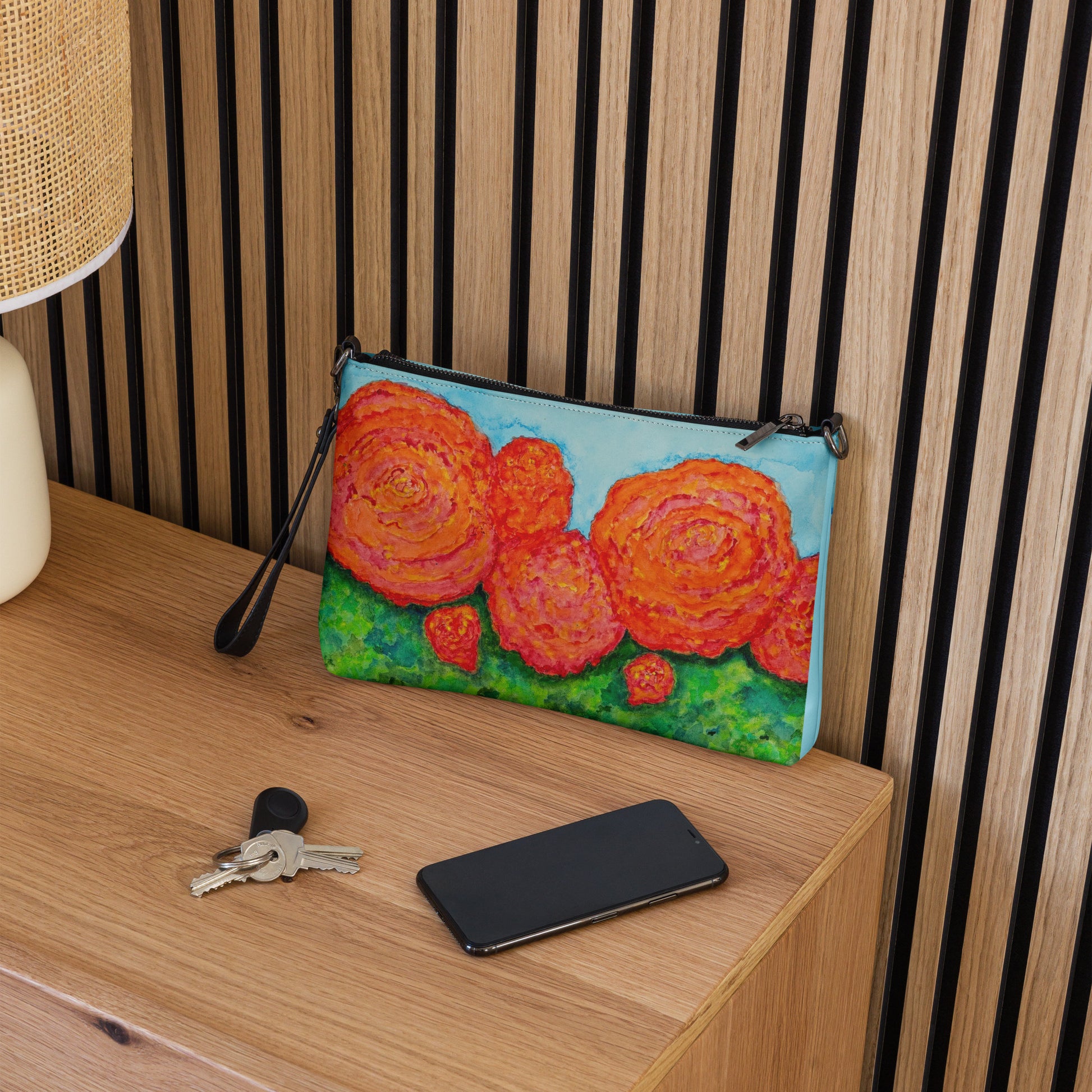 Stylish crossbody bag featuring original artwork—compact, lightweight, and designed for hands-free convenience; perfect for everyday use, travel, or festivals with artistic flair and functional storage.