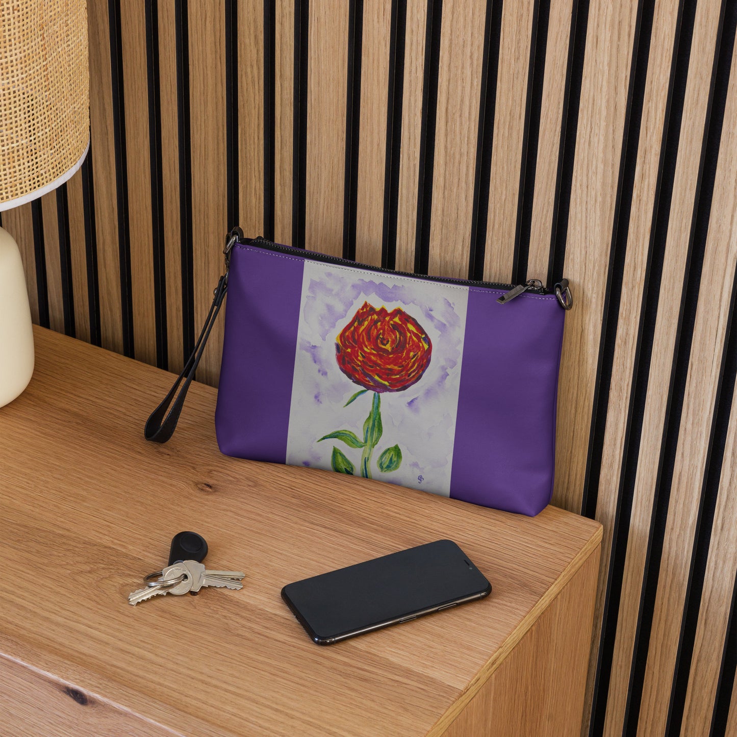 Stylish crossbody bag featuring original artwork—compact, lightweight, and designed for hands-free convenience; perfect for everyday use, travel, or festivals with artistic flair and functional storage.