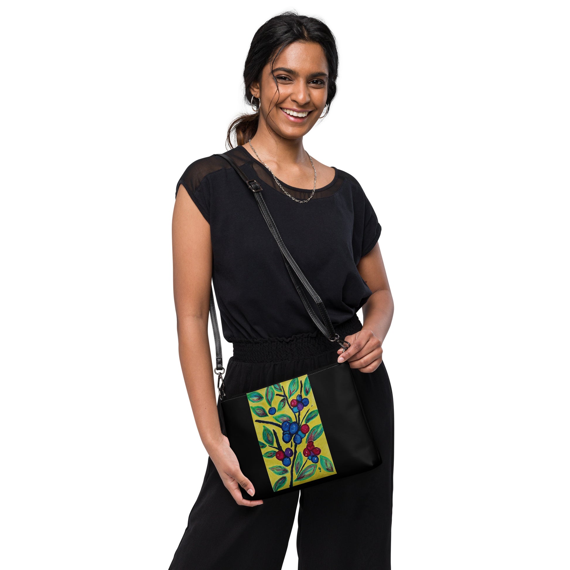Stylish crossbody bag featuring original artwork—compact, lightweight, and designed for hands-free convenience; perfect for everyday use, travel, or festivals with artistic flair and functional storage.