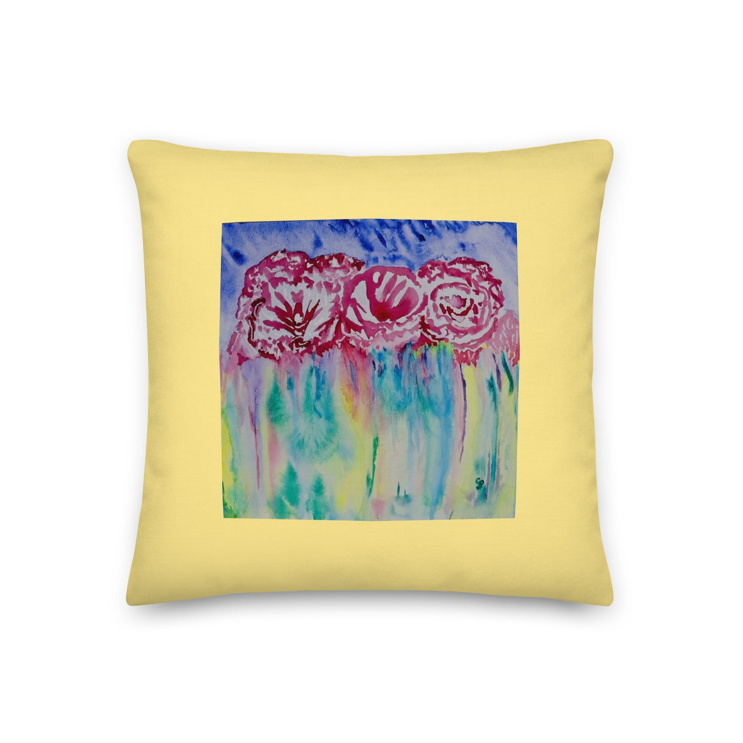 Yellow pillow with a floral design on a white background