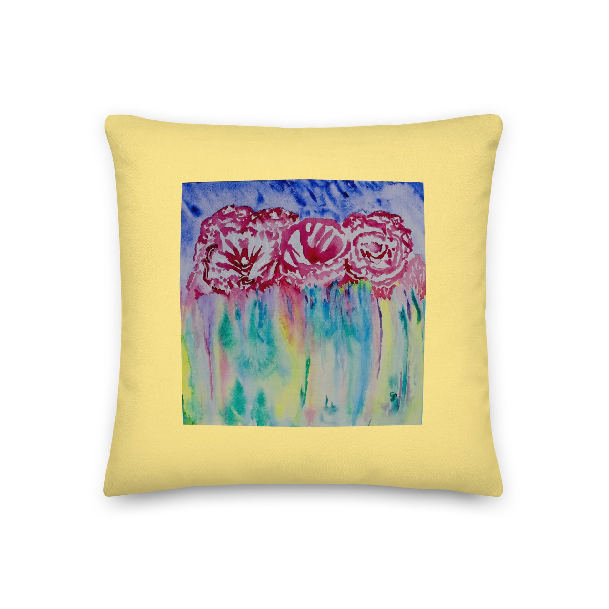 Yellow pillow with a floral design on a white background