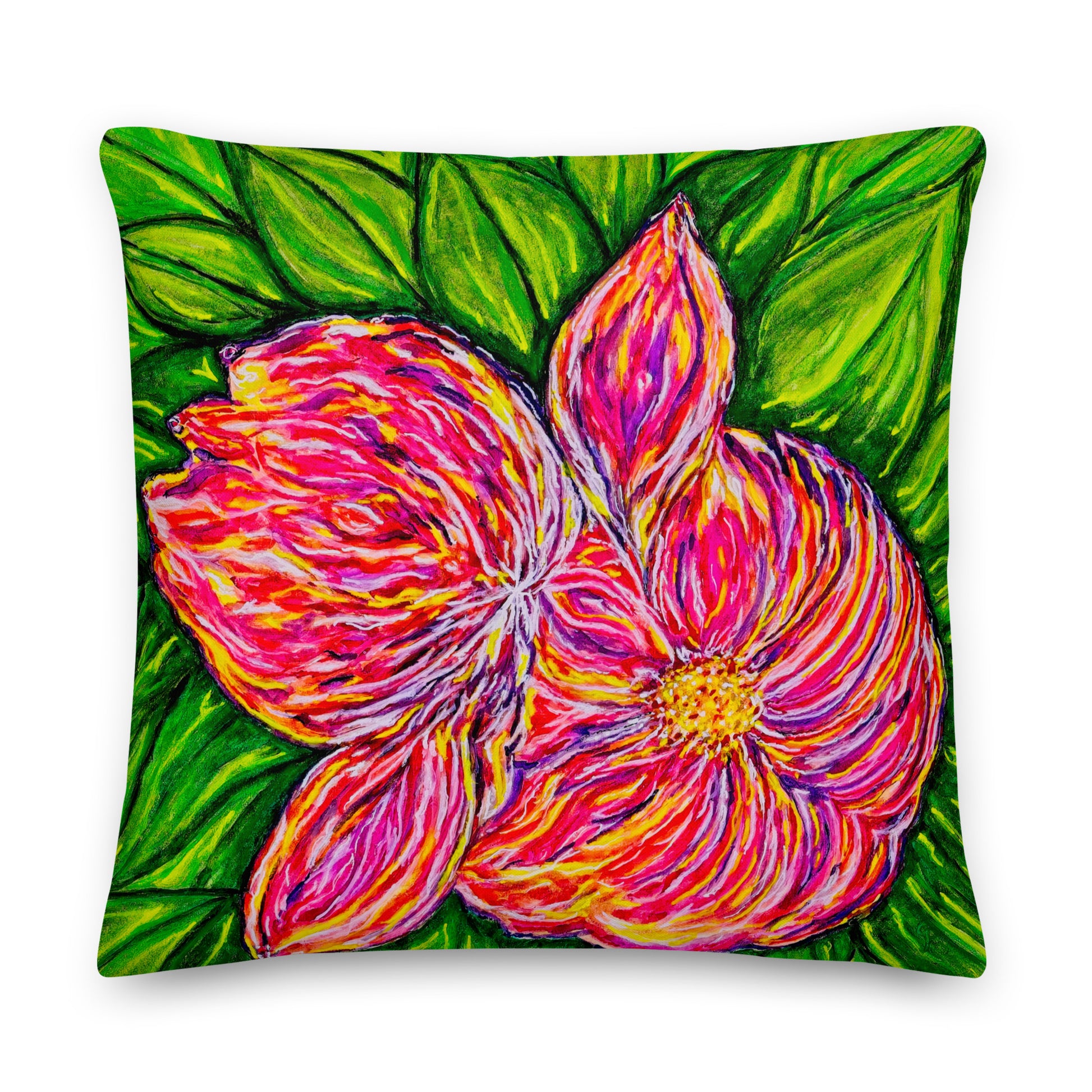 Decorative pillow with a vibrant pink flower design on a green leaf background