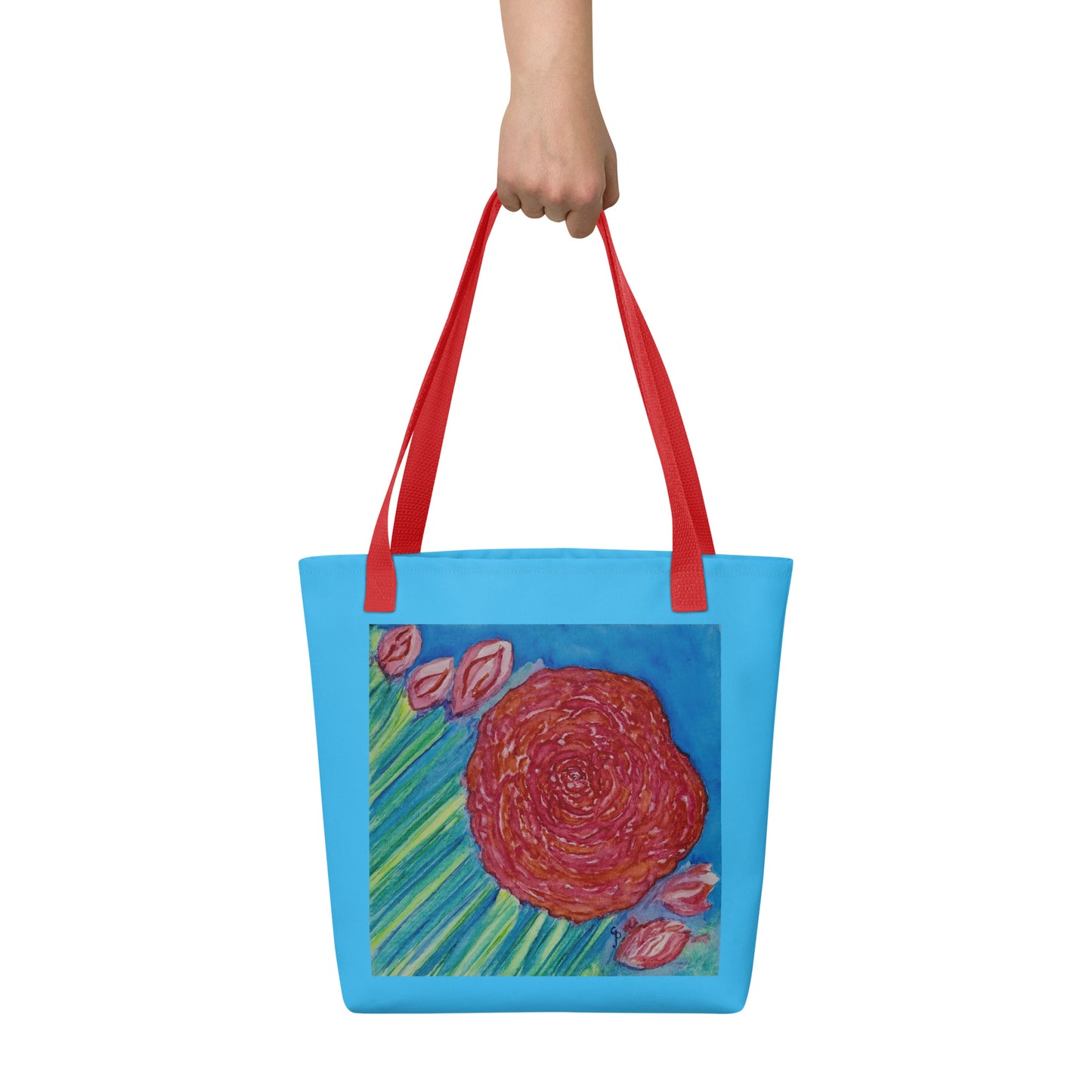 Blue tote bag with red floral design