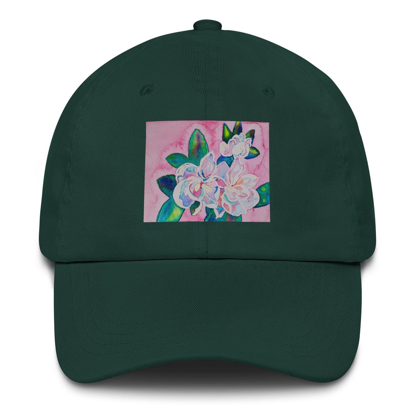 Green cap with a floral design on a pink background