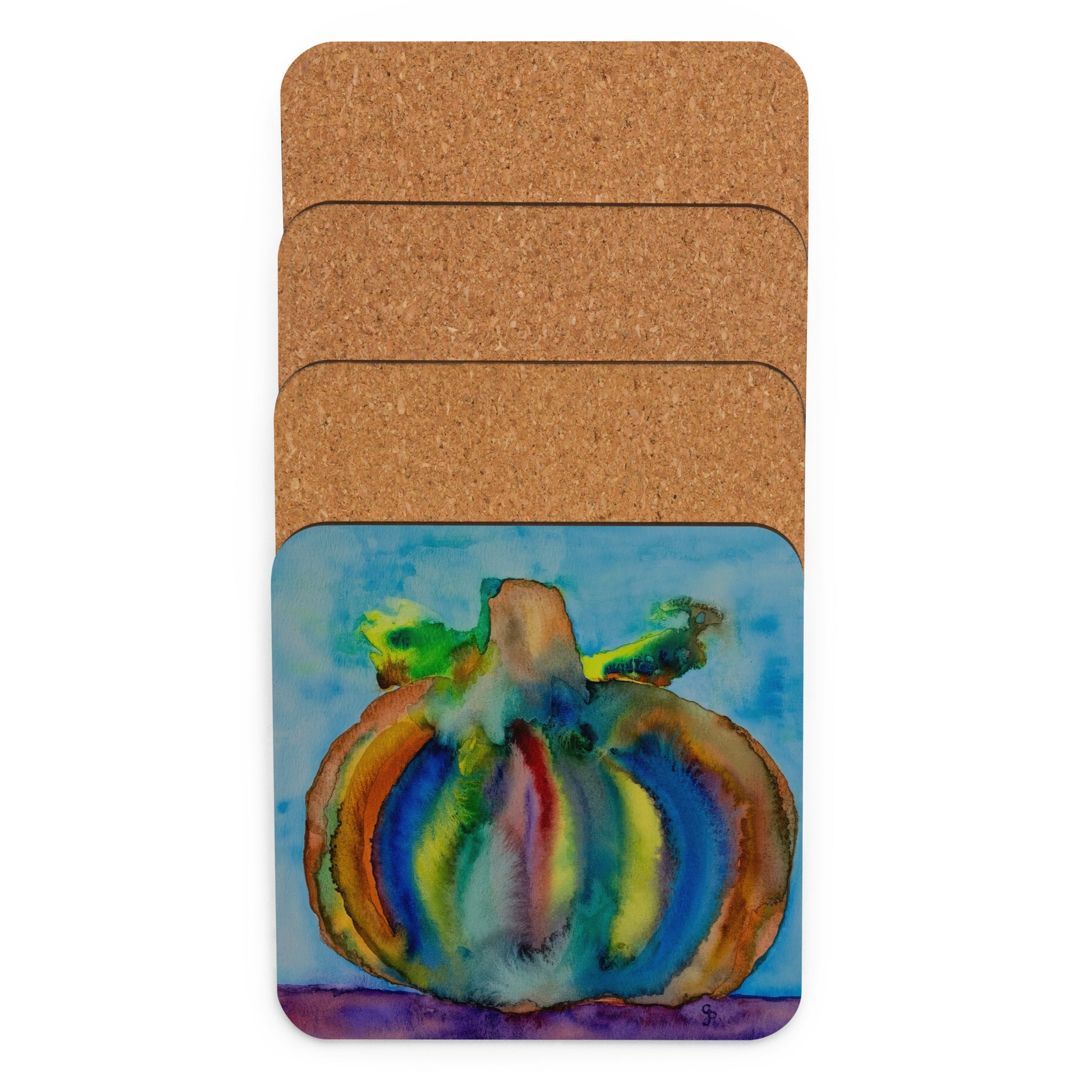 Set of four cork coasters with a colorful pumpkin design on one coaster.