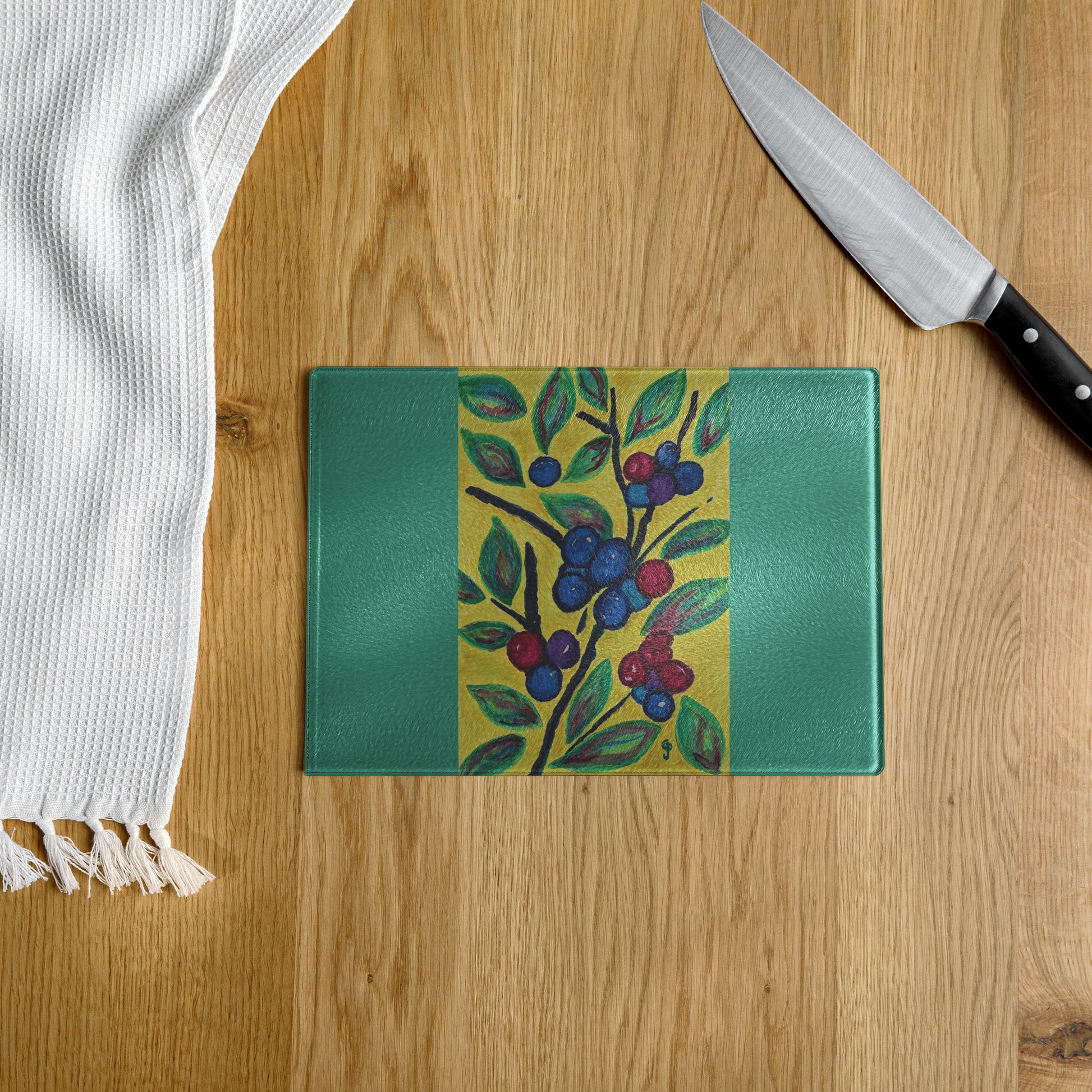Tempered glass cutting board featuring original artwork—durable, heat-resistant, and perfect for food prep or serving; adds a stylish, artistic touch to any kitchen or countertop.