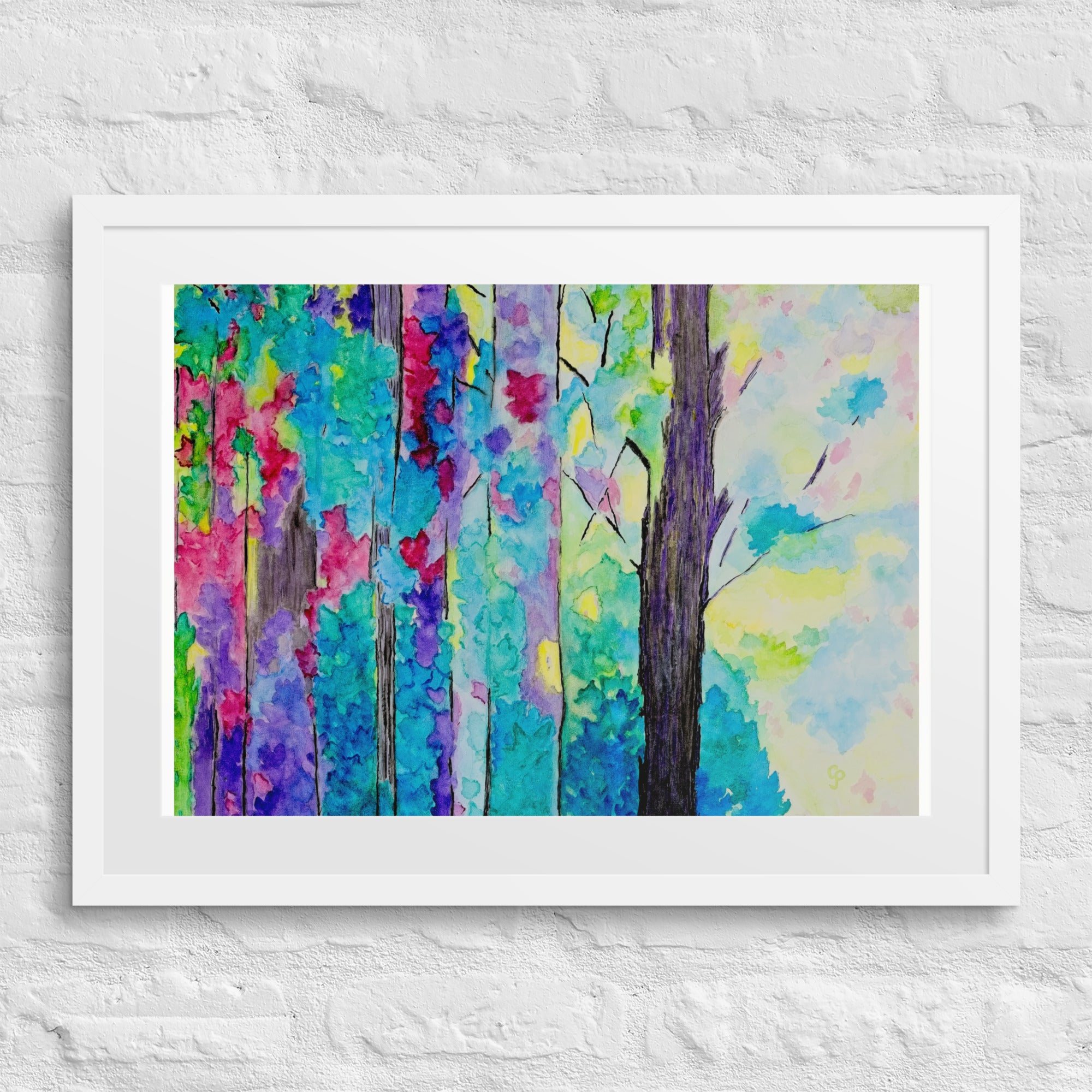 Framed abstract artwork of colorful trees on a white wall