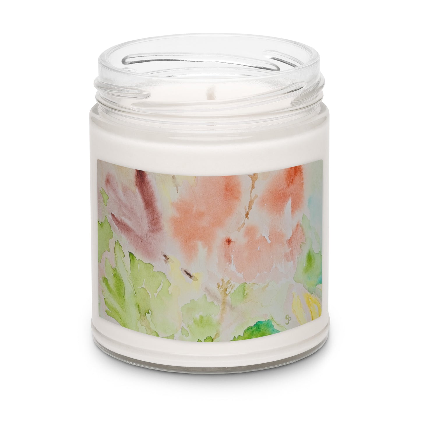 Candle in a glass jar with a floral label on a white background