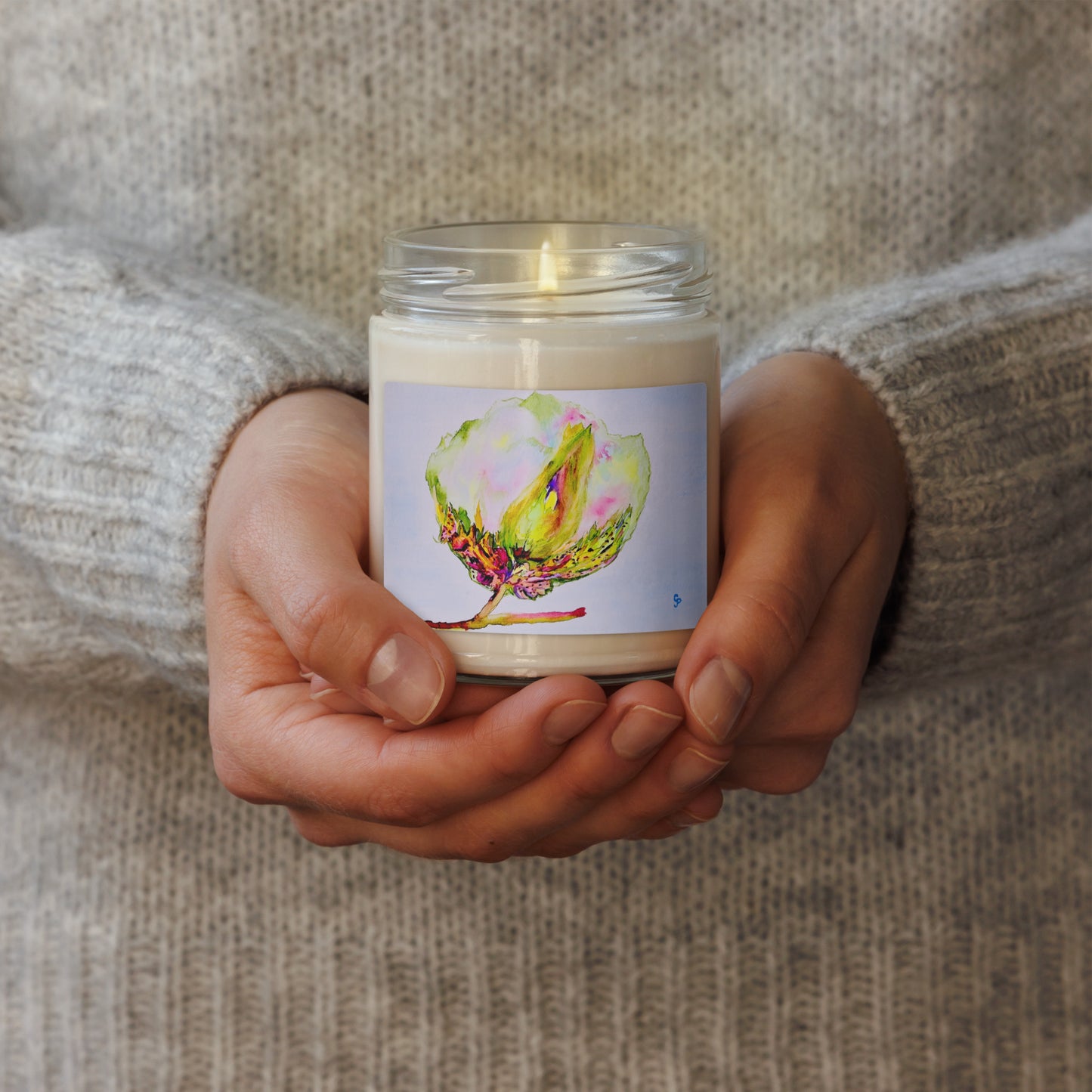 Scented soy candle featuring original artwork on the label—eco-friendly, long-burning, and perfect for home décor, relaxation, or gifting with a natural, clean fragrance.