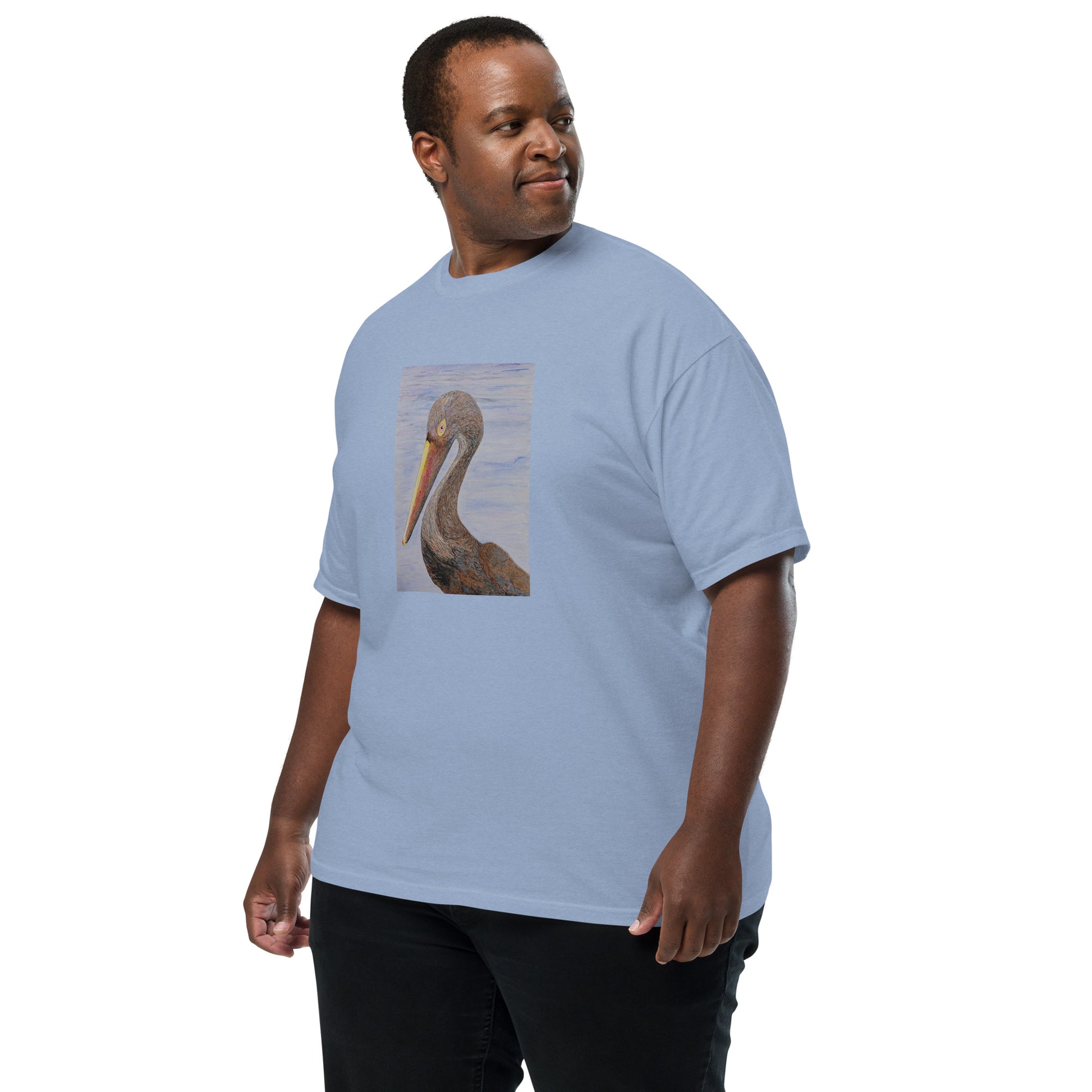 African American man wearing a light blue t-shirt with a pelican graphic on a white background