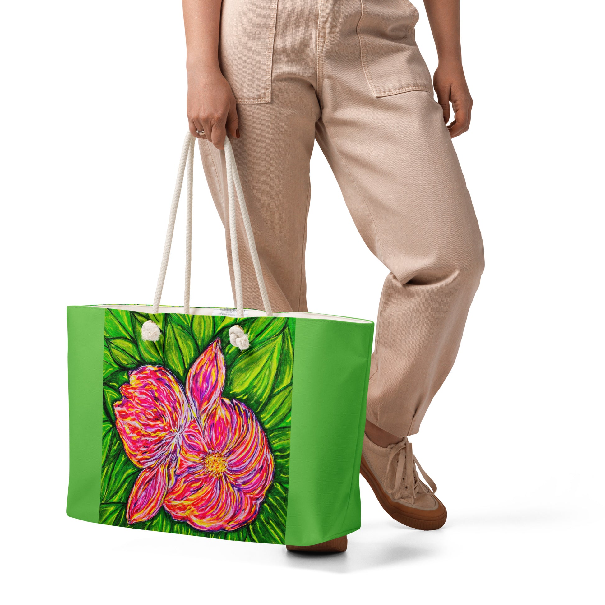 Oversized weekender bag with original floral artwork, featuring a spacious interior, sturdy straps, and lightweight design—perfect for travel, overnight stays, or stylish carry-on use.