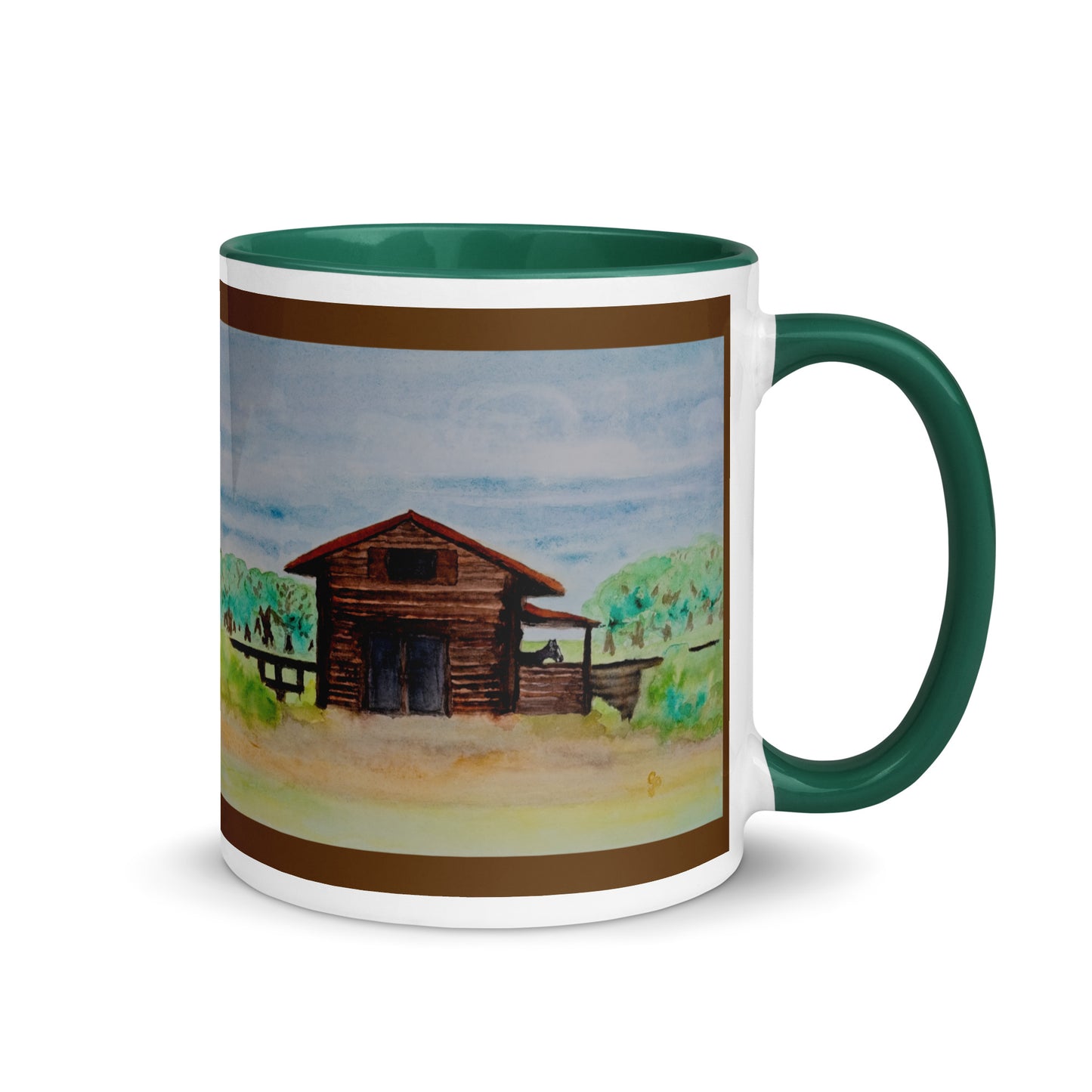 Mug with a painting of a wooden barn on a landscape design.