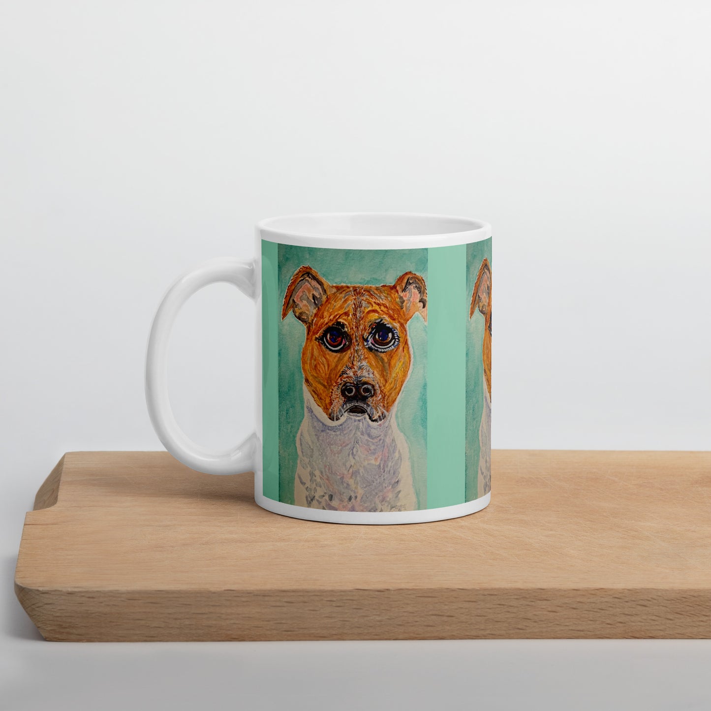 Mug with a dog illustration on a wooden surface