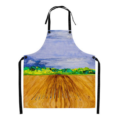 Apron with a painted design of a landscape featuring a blue sky, green trees, and brown field.