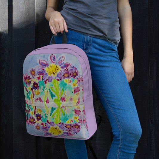 Stylish backpack featuring original artwork, with spacious compartments and durable construction—perfect for school, travel, work, or everyday use; combines function with artistic flair.