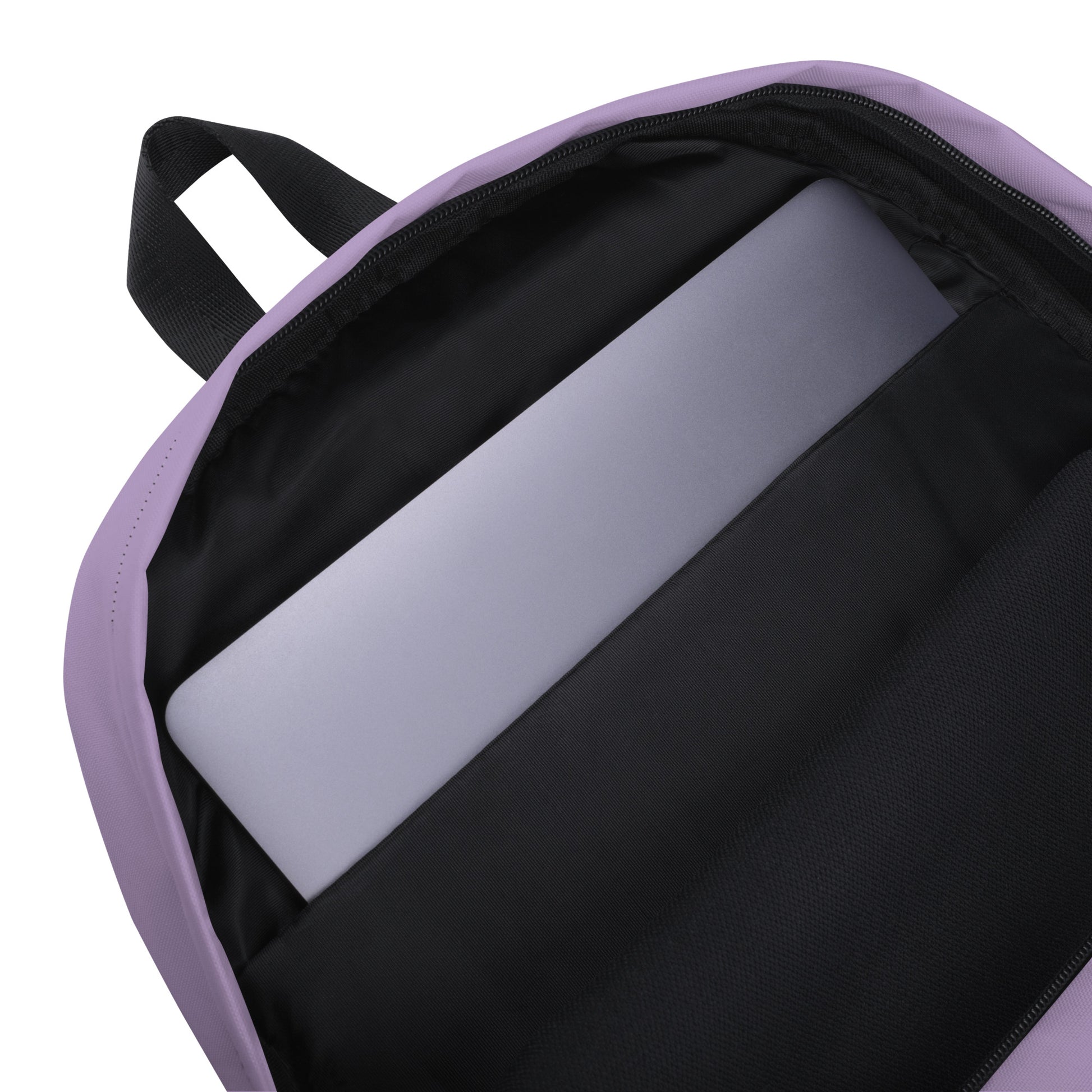 Purple backpack with a laptop compartment on a white background