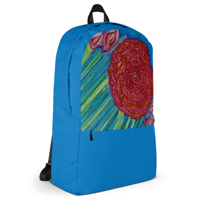 Blue backpack with a colorful floral design on a white background
