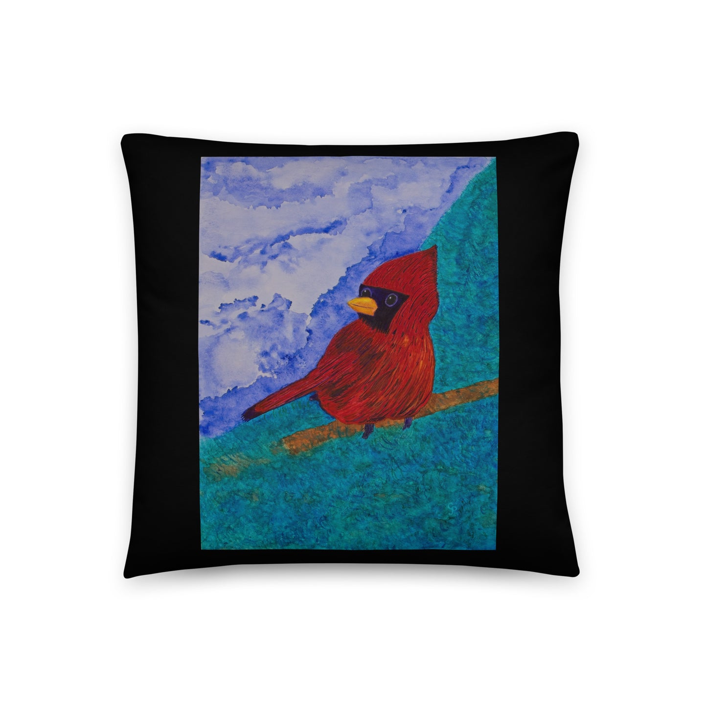 Decorative pillow with a red cardinal bird design on a blue and black background