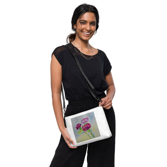 Stylish crossbody bag featuring original artwork—compact, lightweight, and designed for hands-free convenience; perfect for everyday use, travel, or festivals with artistic flair and functional storage.