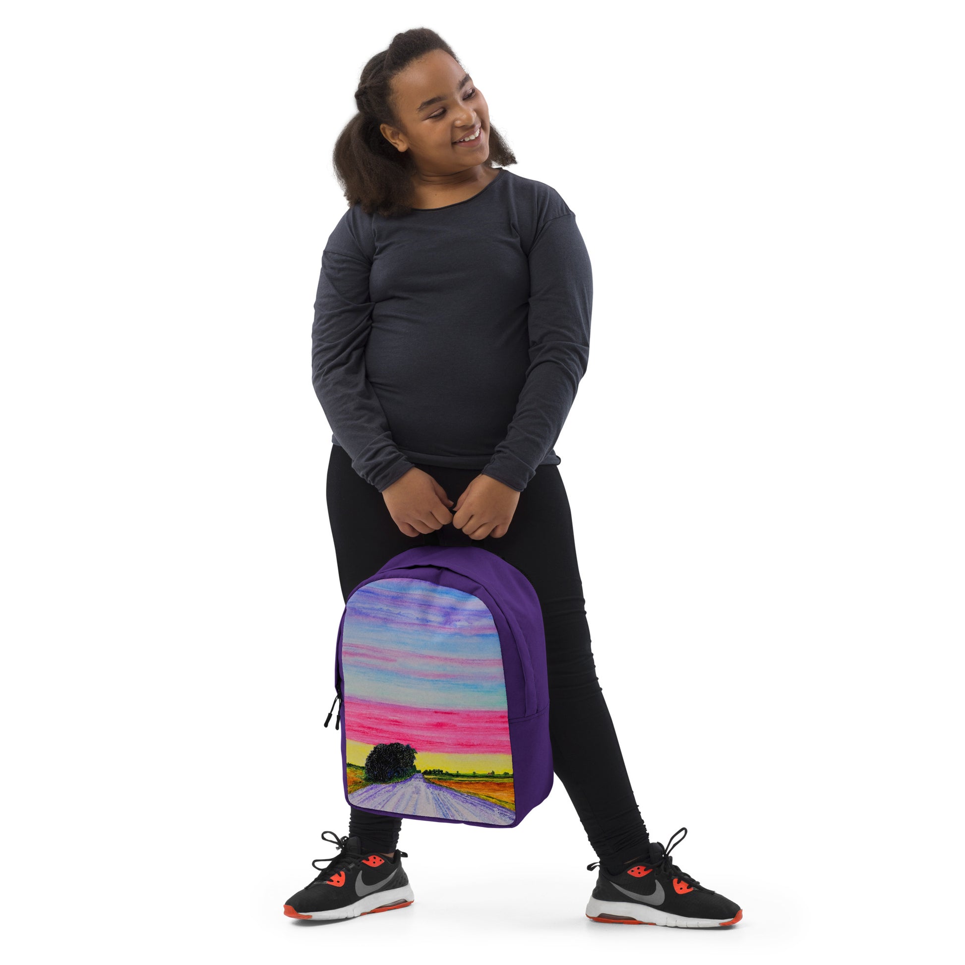 Stylish backpack featuring original artwork, with spacious compartments and durable construction—perfect for school, travel, work, or everyday use; combines function with artistic flair.