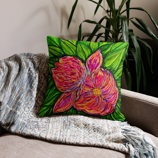 Decorative pillow with a colorful flower design on a couch