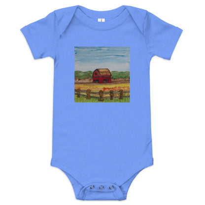 Blue baby onesie with a painted design of a barn on a white background
