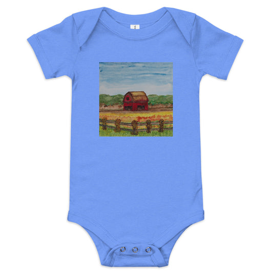 Blue baby onesie with a painted design of a barn on a white background