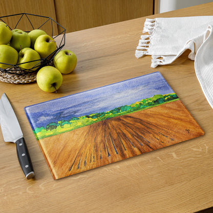 Tempered glass cutting board featuring original artwork—durable, heat-resistant, and perfect for food prep or serving; adds a stylish, artistic touch to any kitchen or countertop.