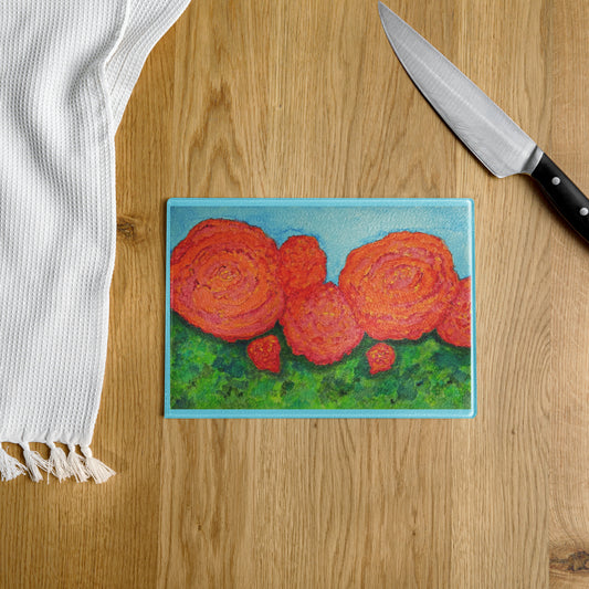 Tempered glass cutting board featuring original artwork—durable, heat-resistant, and perfect for food prep or serving; adds a stylish, artistic touch to any kitchen or countertop.