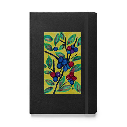Black notebook with a colorful berry design on a yellow background