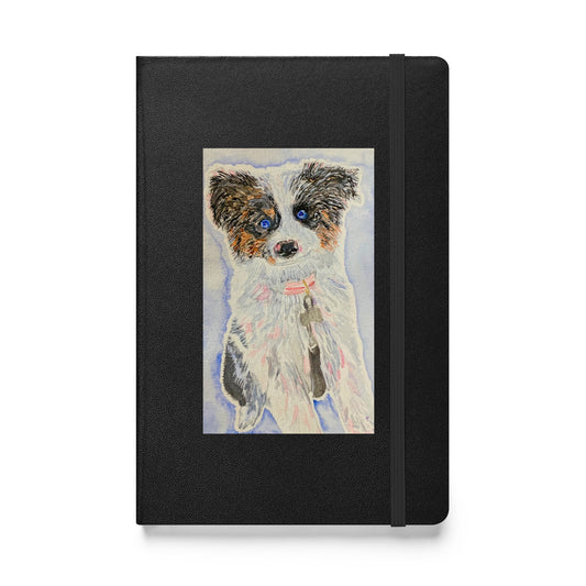 Black notebook with an original Australian shepherd dog watercolor on it