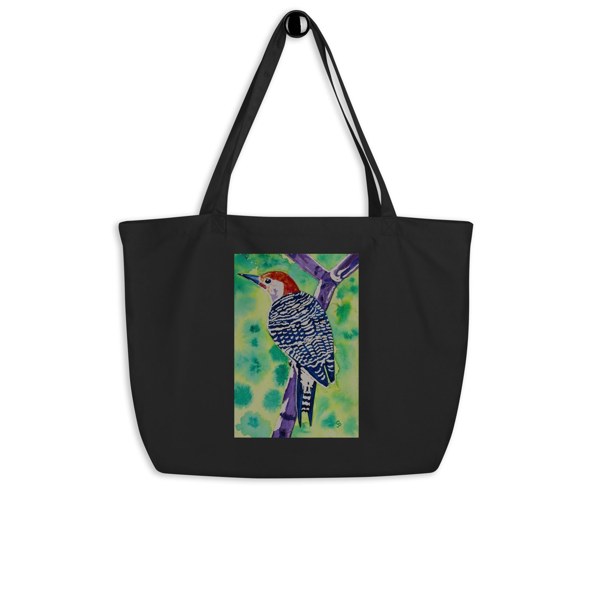 Large organic tote bag with original watercolor artwork, featuring a spacious interior, sturdy straps, and lightweight design—perfect for travel, overnight stays, or stylish carry-on use.