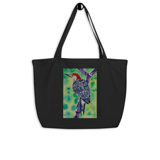 Large organic tote bag with original watercolor artwork, featuring a spacious interior, sturdy straps, and lightweight design—perfect for travel, overnight stays, or stylish carry-on use.