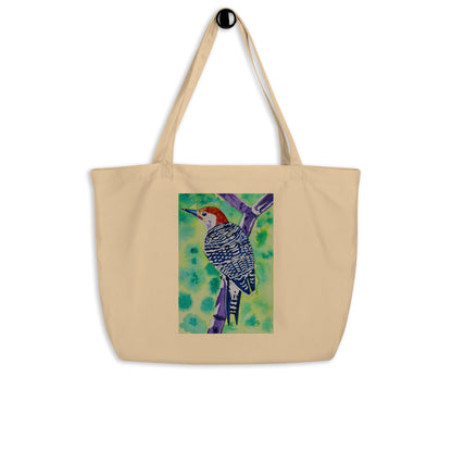 Large organic tote bag with original watercolor artwork, featuring a spacious interior, sturdy straps, and lightweight design—perfect for travel, overnight stays, or stylish carry-on use.