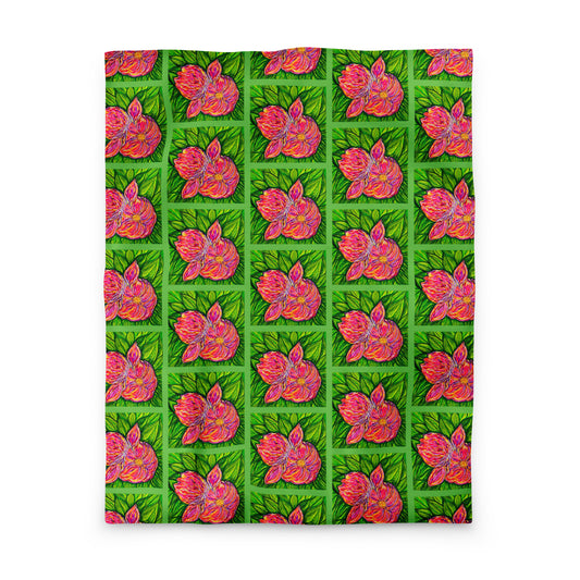 Patterned fabric with pink floral design on a green background