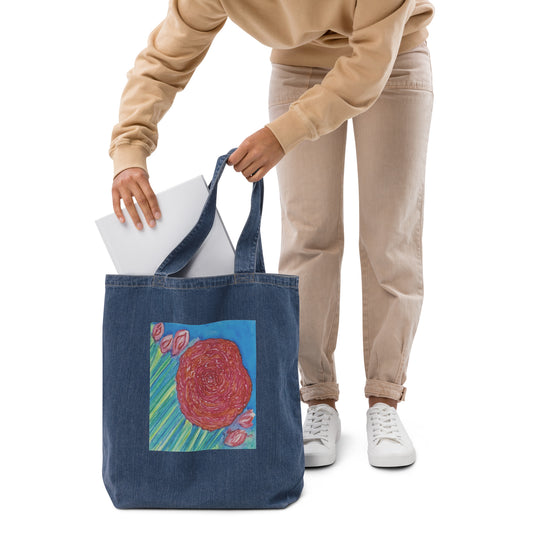 Large organic denim tote bag with original watercolor artwork, featuring a spacious interior, sturdy straps, and lightweight design—perfect for travel, overnight stays, or stylish carry-on use.