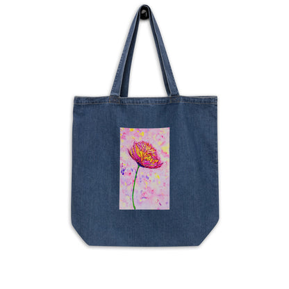 Organic denim tote bag with original watercolor artwork, featuring a spacious interior, sturdy straps, and lightweight design—perfect for travel, overnight stays, or stylish carry-on use.