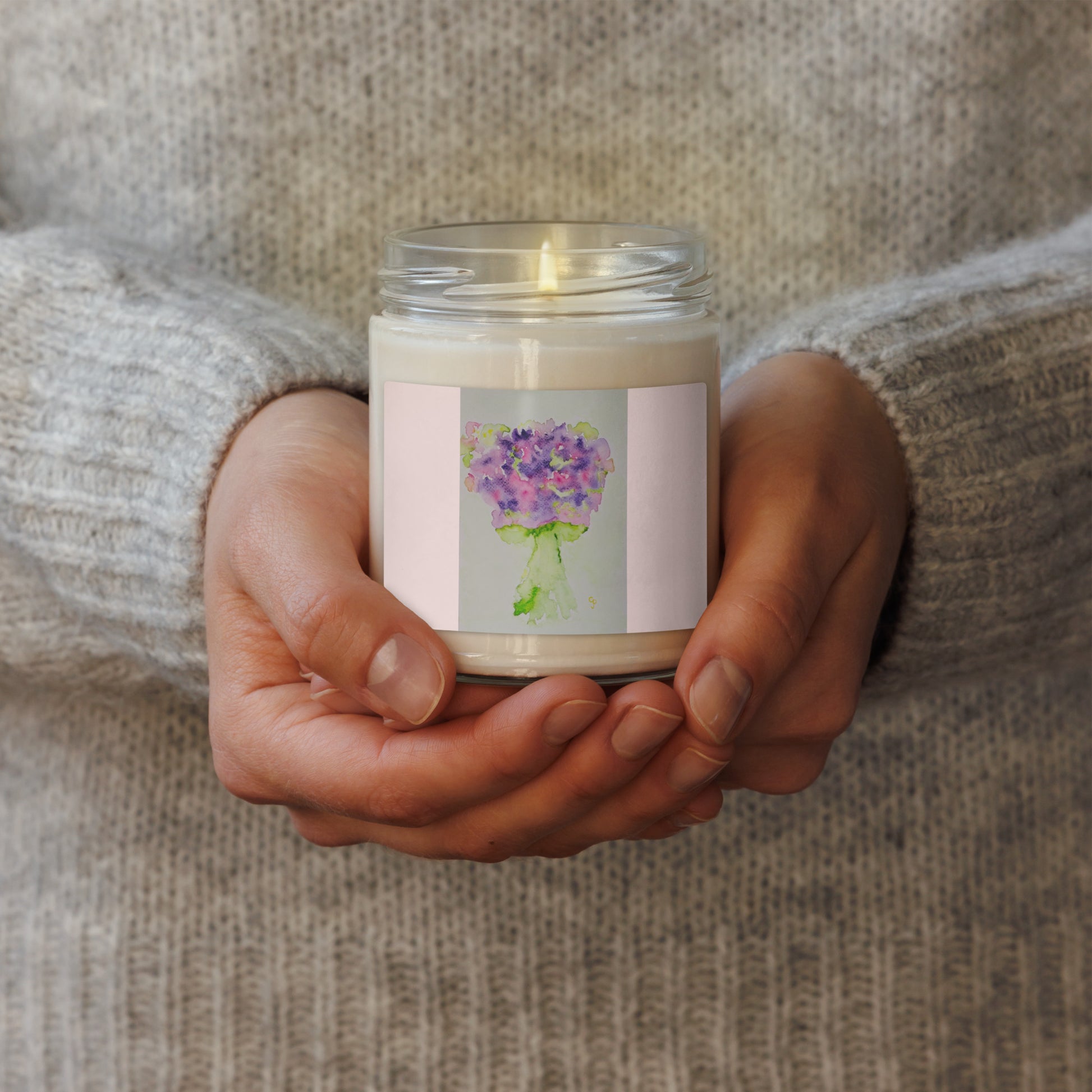 Scented soy candle featuring original artwork on the label—eco-friendly, long-burning, and perfect for home décor, relaxation, or gifting with a natural, clean fragrance.