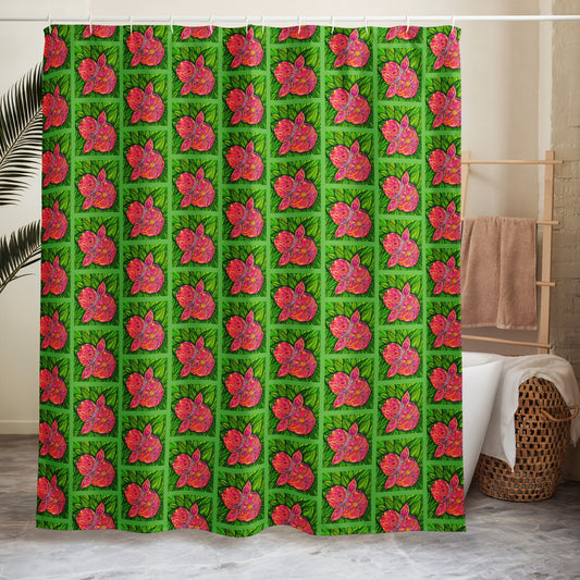 Shower curtain with pink floral pattern on green background in a bathroom setting