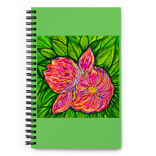 Notebook with a colorful flower watercolor design on a green background