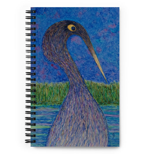 Notebook with a painted cover of a Anhinga bird on water against a blue sky