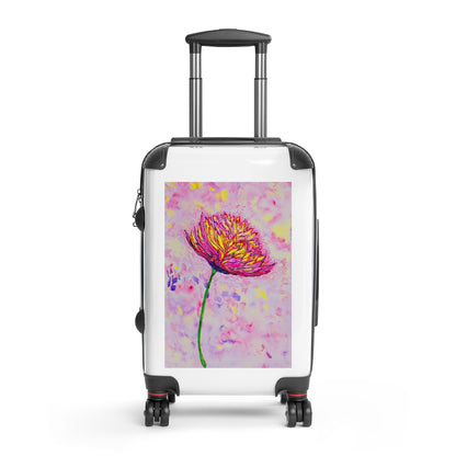 Suitcase with a colorful flower design on a white background
