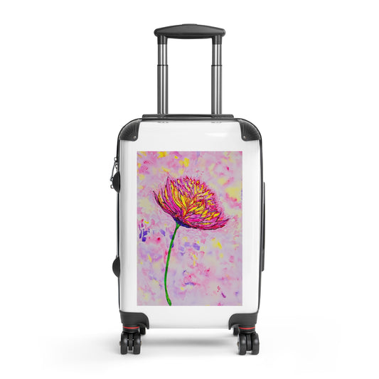 Suitcase with a colorful flower design on a white background