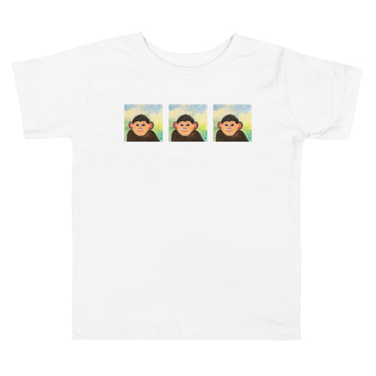 White t-shirt with three monkey illustrations on a white background
