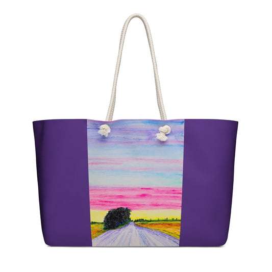 Tote bag with a colorful landscape design on a white background