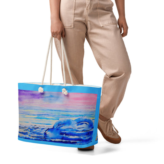 Oversized weekender bag with original watercolor artwork, featuring a spacious interior, sturdy straps, and lightweight design—perfect for travel, overnight stays, or stylish carry-on use.