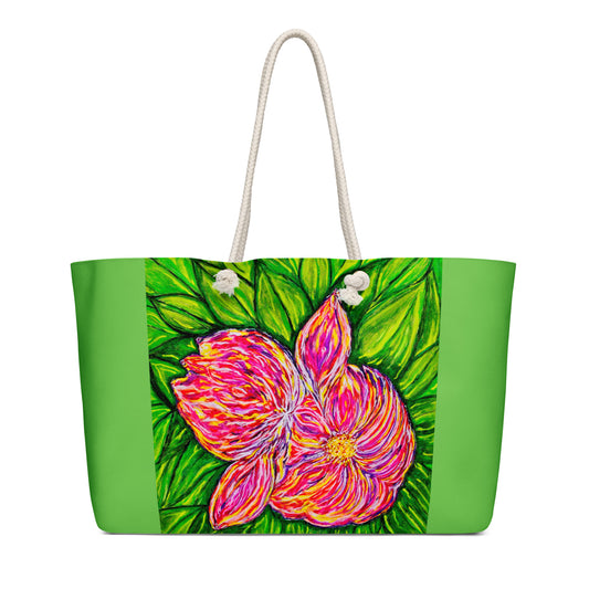 Oversized weekender bag with original floral artwork, featuring a spacious interior, sturdy straps, and lightweight design—perfect for travel, overnight stays, or stylish carry-on use.