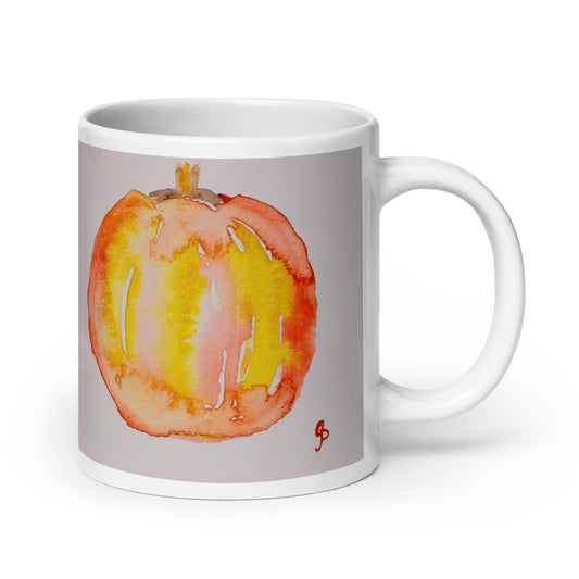 Mug with a watercolor design of a pumpkin on a gray background