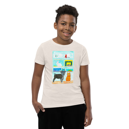 Child wearing a white t-shirt with a colorful graphic watercolor design on a white background